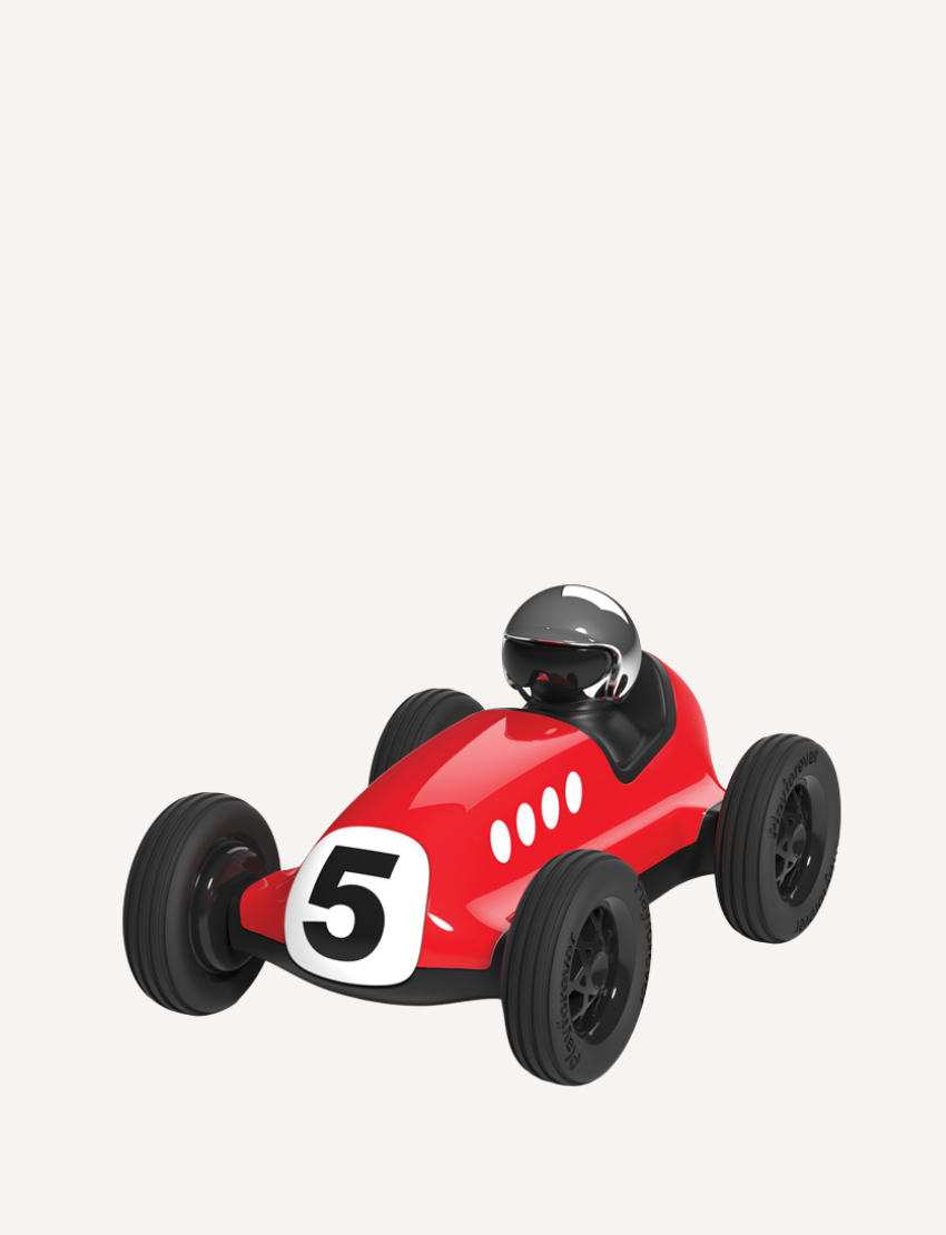 The Verve Loretino Marino toy car by Playforever is displayed against a plain white background. This stylish red race car, with black wheels and the number 5 on its front, boasts a sleek design and features a small driver's seat with a silver helmet.