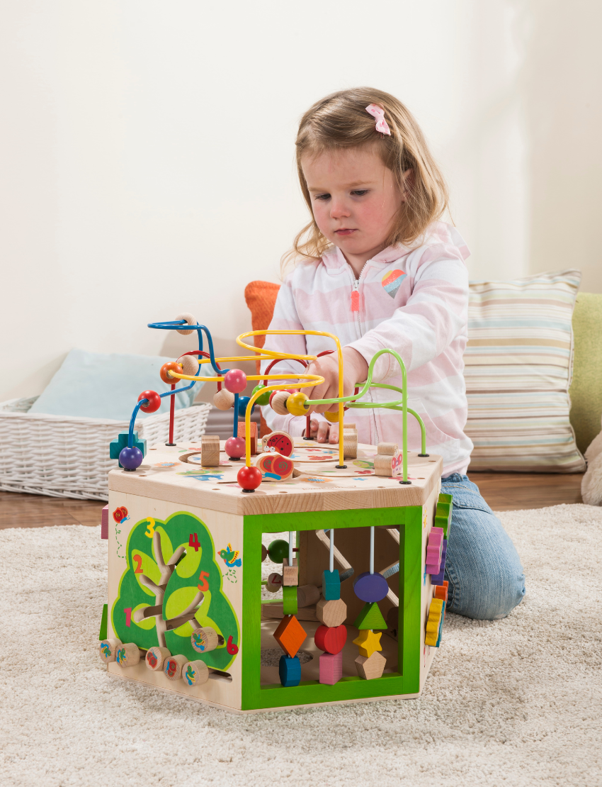 The EverEarth Educational 7-in-1 Garden Activity Cube is vibrant with colorful bead mazes, spinning gears, shape sorters, and sliding beads to enhance fine motor skills. Decorated with butterfly and flower designs, this delightful cube offers engaging activities for children.