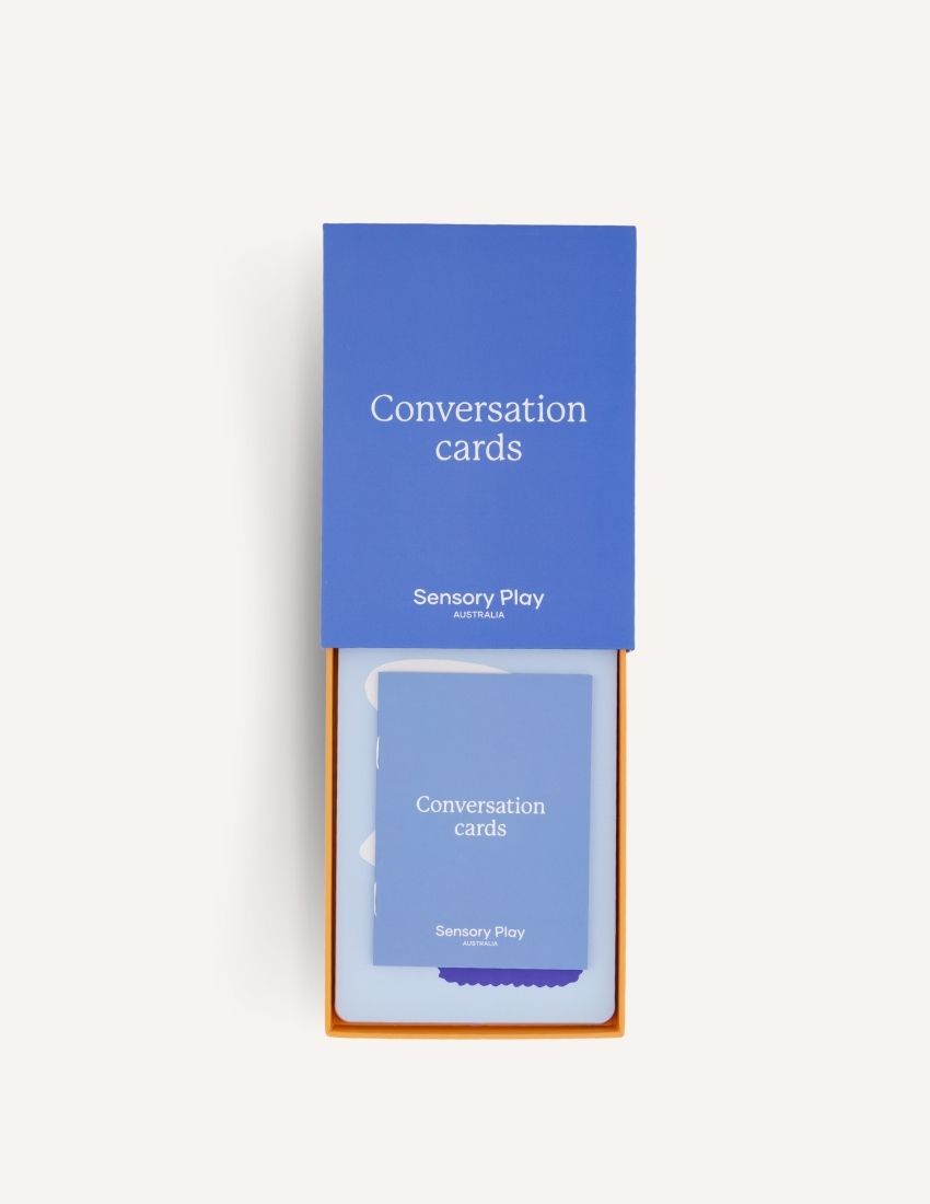 A blue box labeled "Conversation Cards Set in Box" with the text "Sensory Play Australia" at the bottom, designed to enhance emotional intelligence.