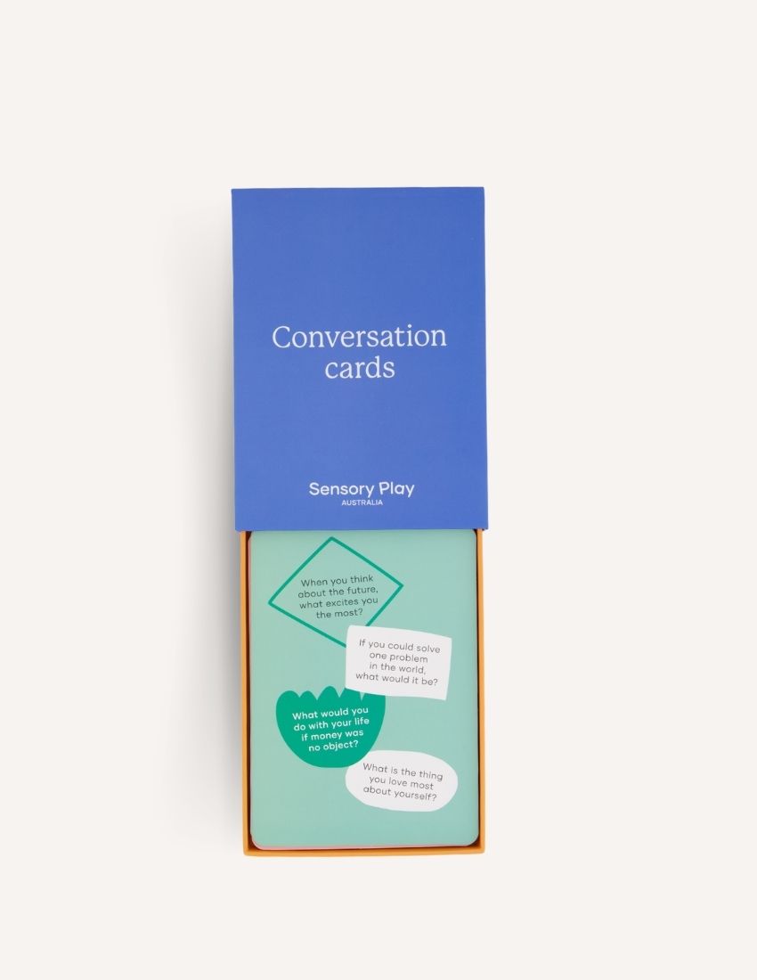 A blue box labeled "Conversation Cards Set in Box" with the text "Sensory Play Australia" at the bottom, designed to enhance emotional intelligence.