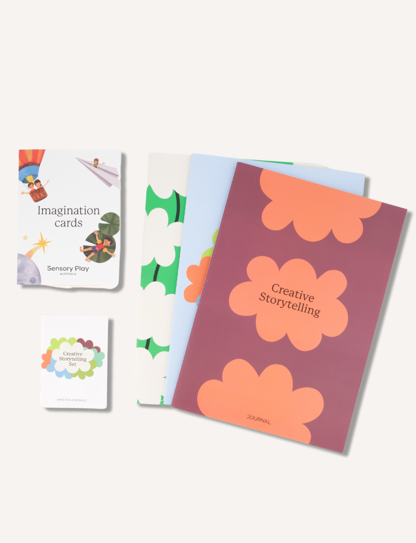 Explore the Creative Storytelling Set by Sensory Play Australia, featuring "Imagination cards," three floral-patterned notebooks, and a "Creative Storytelling Journal," all designed to inspire imaginative expression and hone language skills.