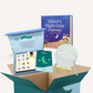 The Sleep Buddy by Sensory Play Australia is a delightful sleep-themed gift box featuring the children's book "Finley's Night-time Journey," a soothing bedtime routine board game, a comforting "Sweet Dreams" night light, and an informative booklet titled "Sleep." These items are elegantly organized in an open teal box to create the ideal sleep companion for your little one.
