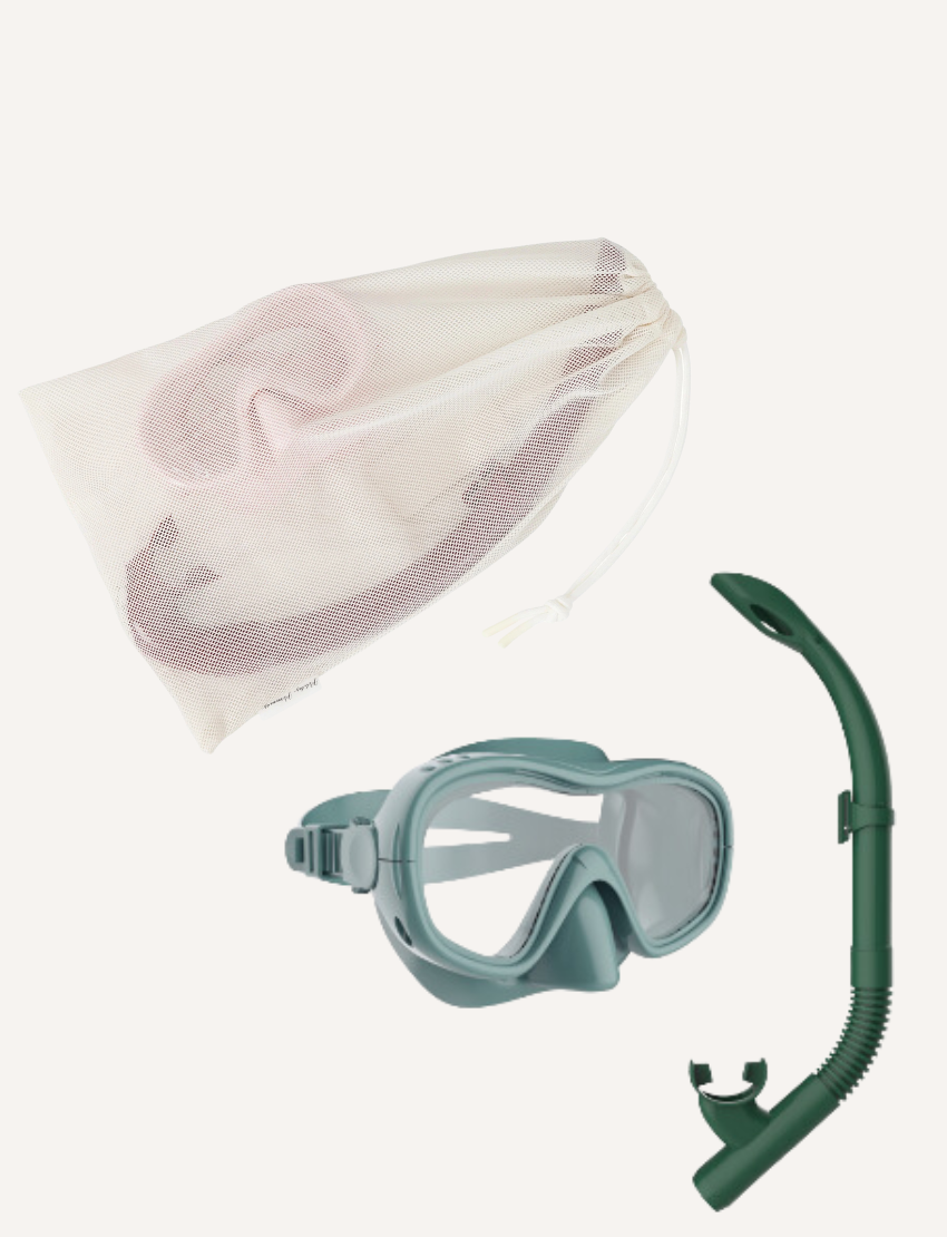 Green snorkel and mask set with a mesh bag, perfect for underwater exploration and swimming.
