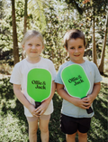 Ollie & Jack's LED Pickleball Bat Set includes two vibrant green paddles with black handles and the brand's logo, making it perfect for an exciting game for ages 6 and up.