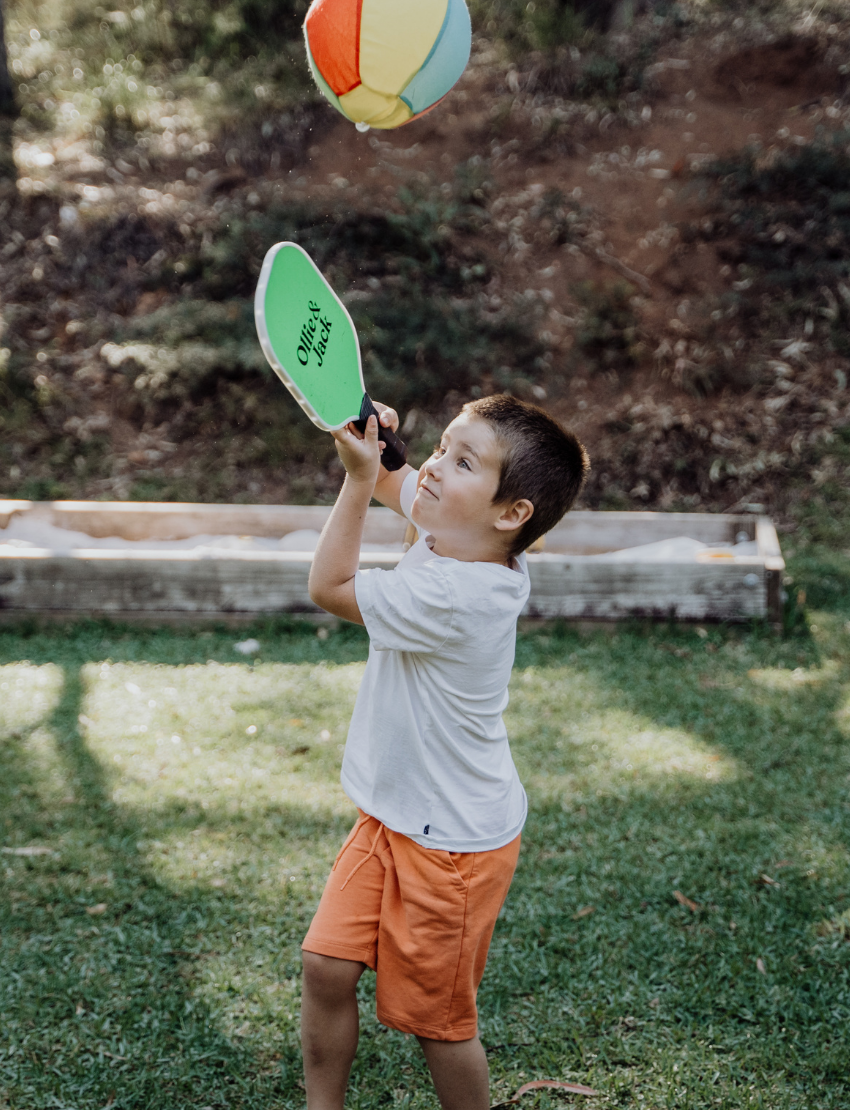 Ollie & Jack's LED Pickleball Bat Set includes two vibrant green paddles with black handles and the brand's logo, making it perfect for an exciting game for ages 6 and up.