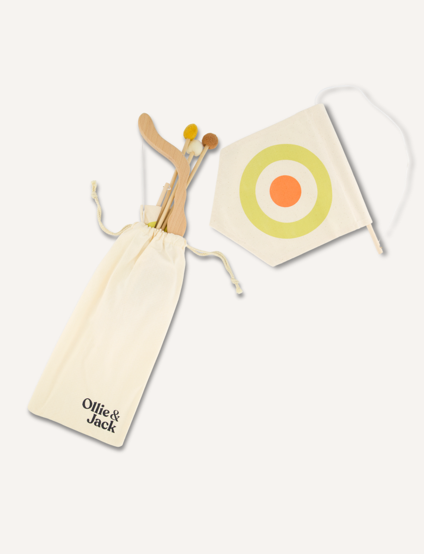 The Ollie & Jack Bow & Arrow Set is a classic wooden toy set for ages 5+, featuring a bow with a string and three soft-tipped arrows in white, yellow, and brown, ideal for developing strength during active play.