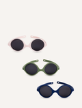 Three pairs of Ki ET LA DIABOLA baby sunglasses (0-1 year old) with total UV protection are stacked vertically: pink on top, green in the middle, and blue at the bottom. Each pair features thick frames and an identical design for optimal style and safety.