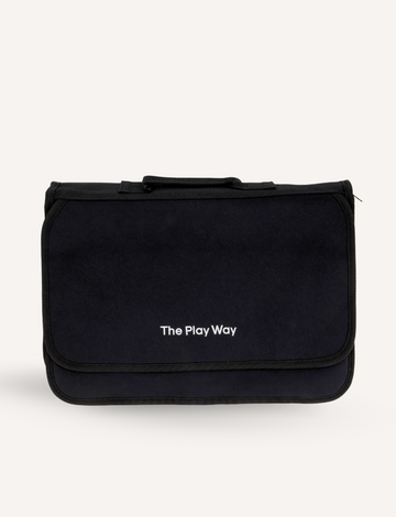 A black rectangular bag from The Play Way, featuring a handle on top and "The Play Way" printed in white on the front flap. With clean, simple lines and made of fabric material, The Play Way Compendium is ideal for creative spaces, helping to keep handwriting organization tools neatly stored. The background is plain white.