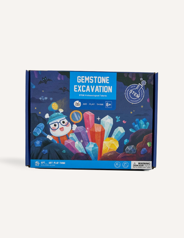 The image depicts a "Gemstone Excavation" STEM Archaeologist Kit by Jar Melo, intended for children aged 6 and older. The box showcases vibrant illustrations of a character unearthing various gemstones. It emphasizes "art, play, think" on the packaging and includes a safety warning.