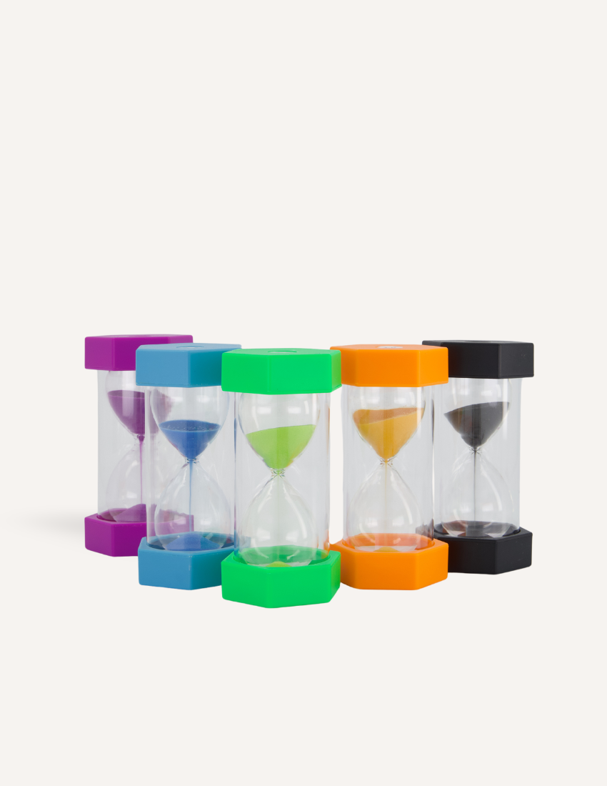 The Sand Timers Set by Sensory Play Australia, a collection of five vibrant sand timers ideal for managing time, is beautifully showcased. Each timer features hexagonal caps and bases in shades of purple, blue, green, orange, and black with coordinating sand inside. All the timers are neatly lined up against a plain white background.