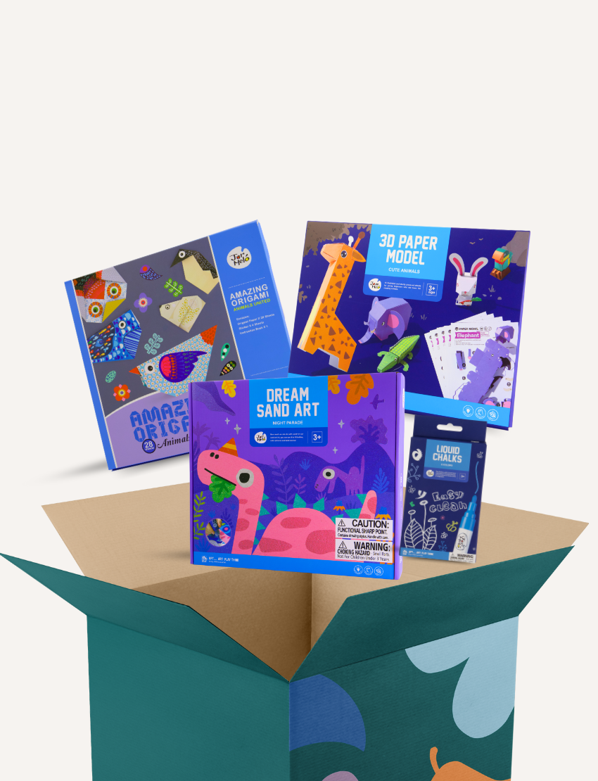 A teal box is open with four colorful "Fine Motor Practice Craft Kits" by The Play Way protruding from it. These kits, ideal for creative play and developing fine motor skills, are labeled "Amazing Origami," "3D Paper Model," "Dream Sand Art," and "Liquid Chalks." Each kit features playful illustrations and vibrant colors.