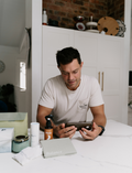 The Therapy At Home Caregiver Wellbeing Training Program includes a ceramic mug, bath salts, aromatherapy eye pillow, tea, notepads, colored pencils, and booklets—perfect for supporting caregiver wellbeing and emotional regulation.