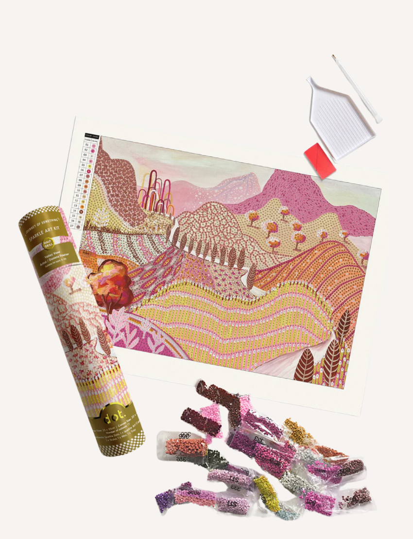 Diamond painting kit with pink landscape, drills, and tool