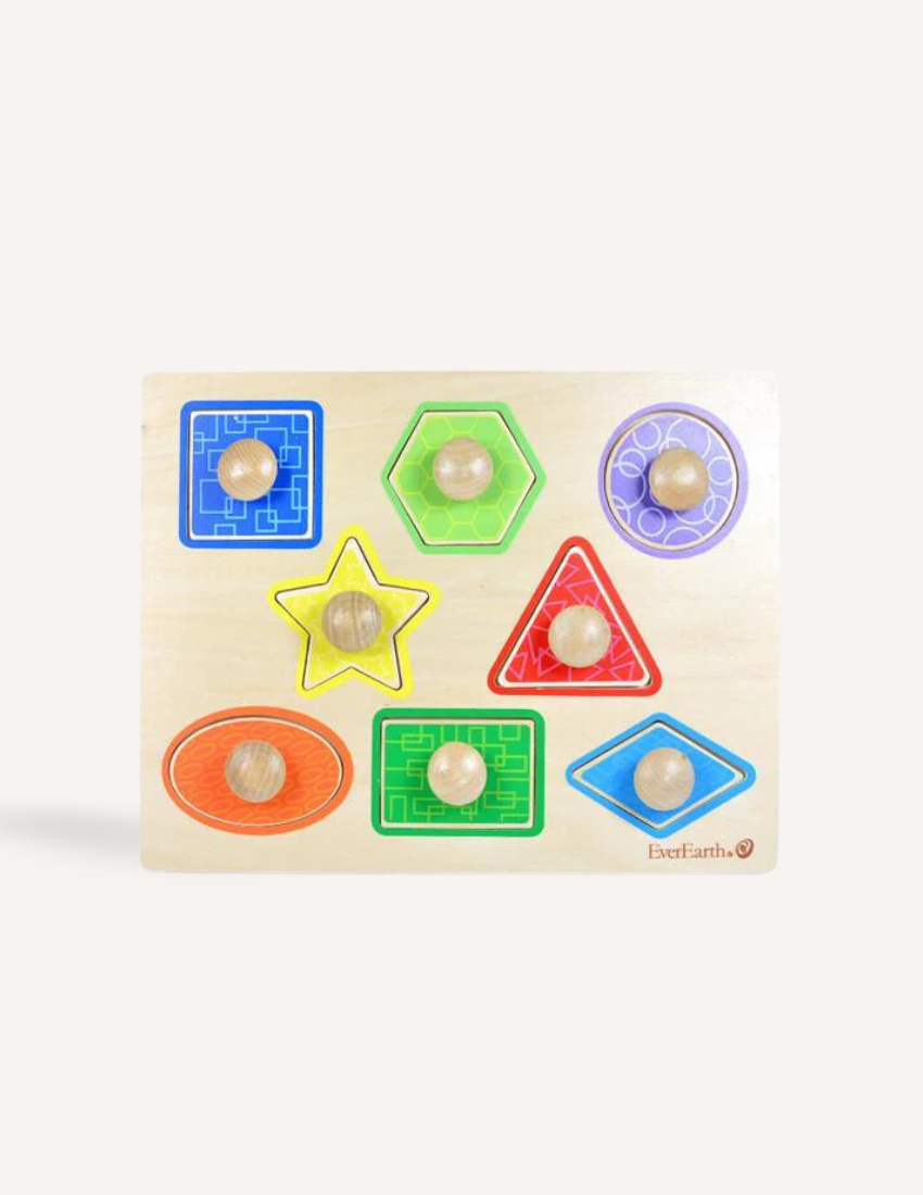 The EverEarth Shape Knob Puzzle is a delightful toddler toy featuring seven differently shaped and colored pieces with knobs: an oval, star, square, triangle, diamond, circle, and hexagon. One oval piece is playfully removed and placed outside the board.