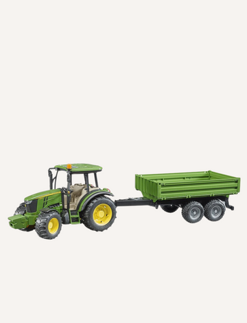 The Bruder John Deere Tractor with Tipping Trailer by Bruder is a compact toy green tractor featuring a yellow wheel trim, paired with a matching tandem-axle trailer. The trailer has two sets of wheels and an open cargo area, ideal for transporting loads during play. The setup is displayed against a plain white background.