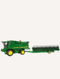 A Bruder John Deere Combine Harvester in green, complete with yellow wheels, is showcased with its header detached and positioned beside it. This T 670i model features a meticulously detailed exterior that captures the essence of traditional agricultural machinery.