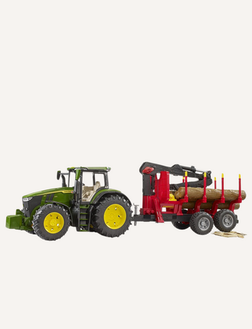 The Bruder John Deere Tractor with Forestry Trailer & Trunks, a green toy tractor inspired by the iconic John Deere 7R, boasts large yellow wheels and is accompanied by a red logging trailer loaded with logs. This miniature agricultural scene on a plain white background beautifully encapsulates the essence of farming equipment in play.