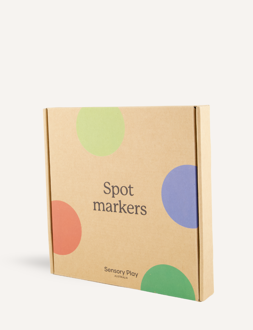 Sensory Play Australia Spot Markers: a box of 10 therapist-designed markers enhancing gross motor skills, balance, and coordination.