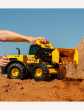 Introducing the Tonka Steel Front Loader, a yellow and black toy truck featuring large wheels, a front loader, and a sleek black cab. Perfectly crafted for children, it showcases the iconic 