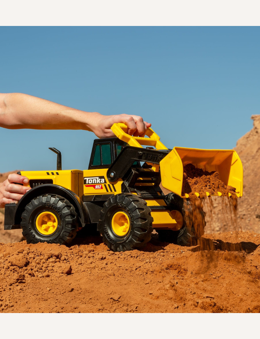 Introducing the Tonka Steel Front Loader, a yellow and black toy truck featuring large wheels, a front loader, and a sleek black cab. Perfectly crafted for children, it showcases the iconic "Tonka" brand on the side and is made from durable materials.