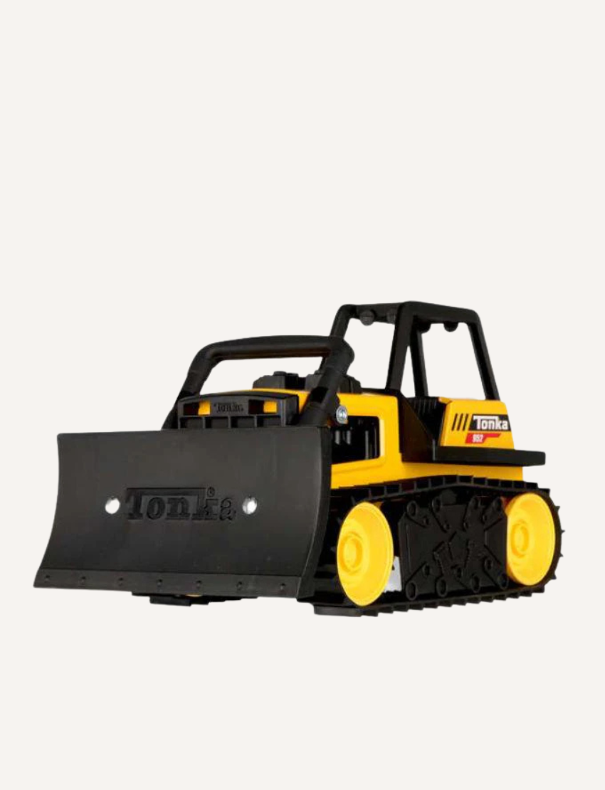 A yellow and black Tonka Steel Bulldozer with "Tonka" displayed on the front blade. As part of the Tonka Steel Classics, it boasts realistic tread and detailing, perfect for imaginative play. The bulldozer is captured at a slight angle against a plain background.