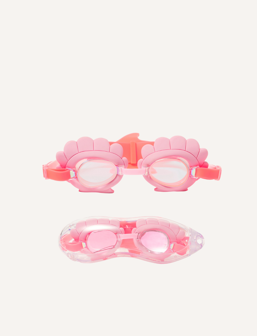 On a plain background, two pairs of Sunnylife's Mini Swim Goggles are displayed. The top pair is pink adorned with a shell design, while the bottom pair is blue with intricate shark details, including fins and teeth.