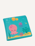 Introducing Janod's Magic Bath Book, a sea-themed sensory adventure! With a cheerful octopus cover, explore playful crabs and fish inside. Perfect for curious minds aged 10 months and up to dive into the wonders of sea creatures today!.