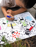 The HeyDoodle Sensory Mat by HeyDoodle provides an engaging coloring experience with black and white insects, perfect for enhancing sensory play and fine motor skills. It comes with vibrant markers to boost interactive learning.