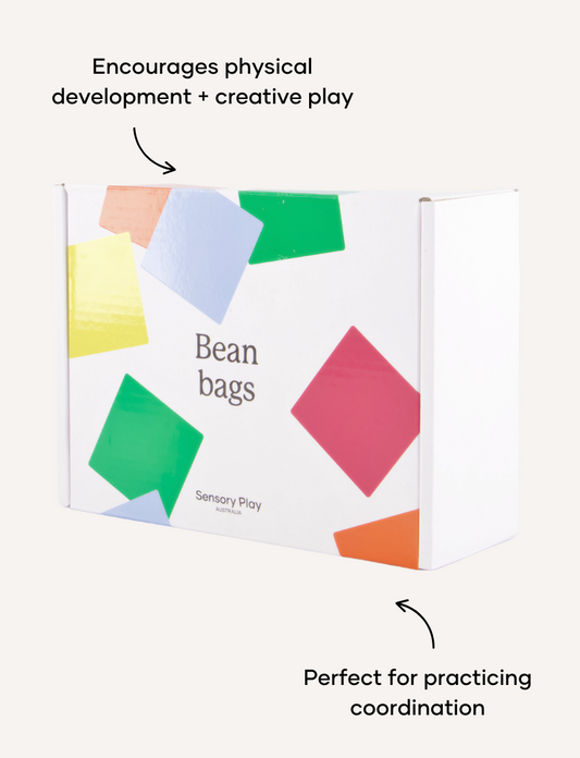 A white box with colorful geometric shapes has "Bean Bags" and "Sensory Play Australia" on the front. Ideal for motor skills and sensory regulation, it offers more than just fun—it's a developmental journey.