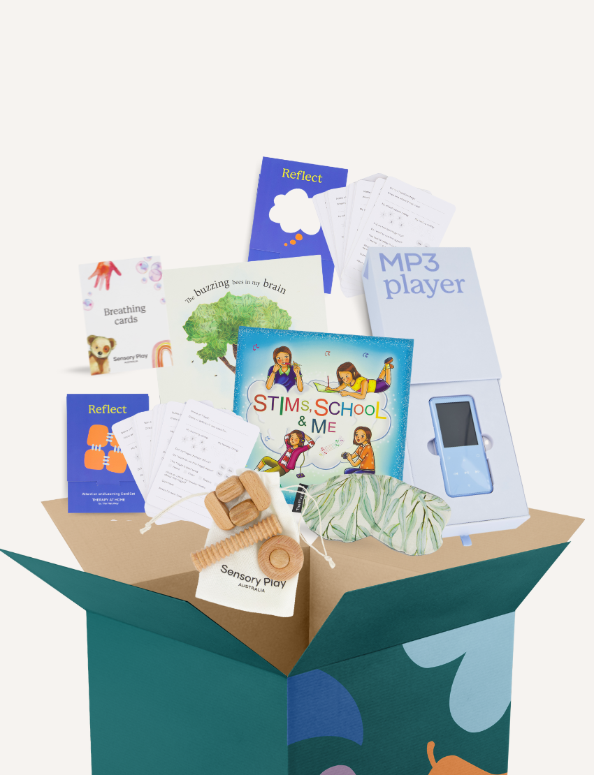 An open The Play Way Reflection Kit, featuring therapist-designed tools like books and an MP3 player for emotional regulation.