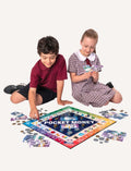 Pocket Money 2 by Knowledge Builder is a board game with play money, coins, cards, pawns, score pads, and dice. Its colorful money-themed design helps kids learn money management through saving and spending choices.