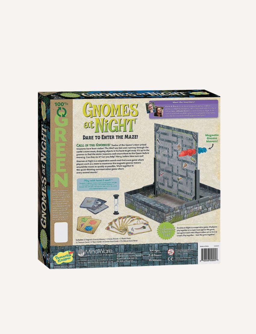 The image shows the box for the Gnomes at Night Game by Peaceable Kingdom, featuring two gnomes with lanterns in front of a stone maze, set against trees and a night sky.