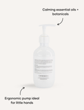 Melo Body Lotion bottle: back view. Calming essential oils. Ergonomic pump ideal for little hands.