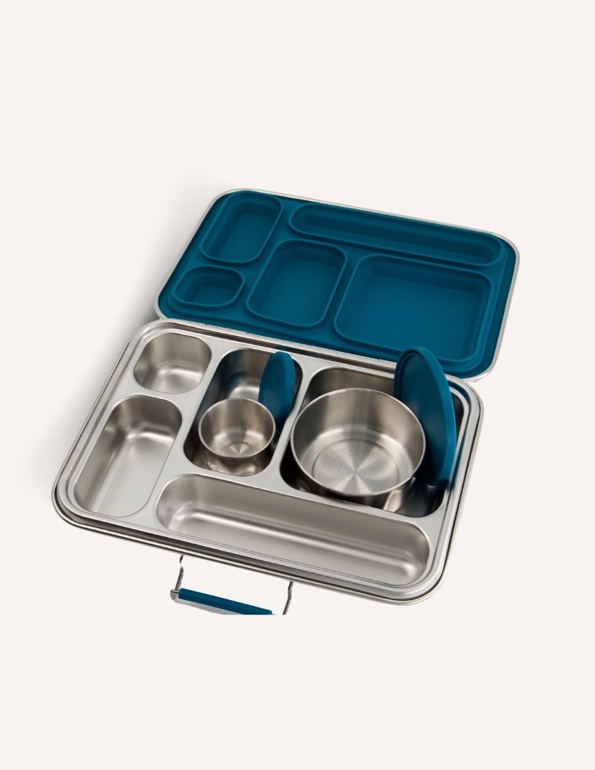 Open The Play Way stainless steel Lunch Buddy Bento box with blue silicone inserts and multiple compartments for organized meals.