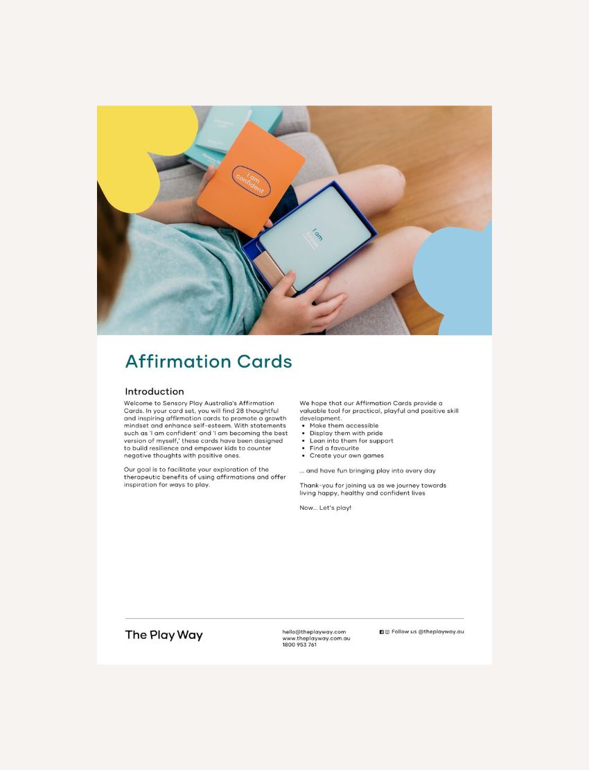 A person sits cross-legged, holding an open box labeled "Affirmation Cards Digital Resource" by The Play Way, filled with cards that foster a growth mindset. Colorful shapes and contact info appear at the bottom of the image.