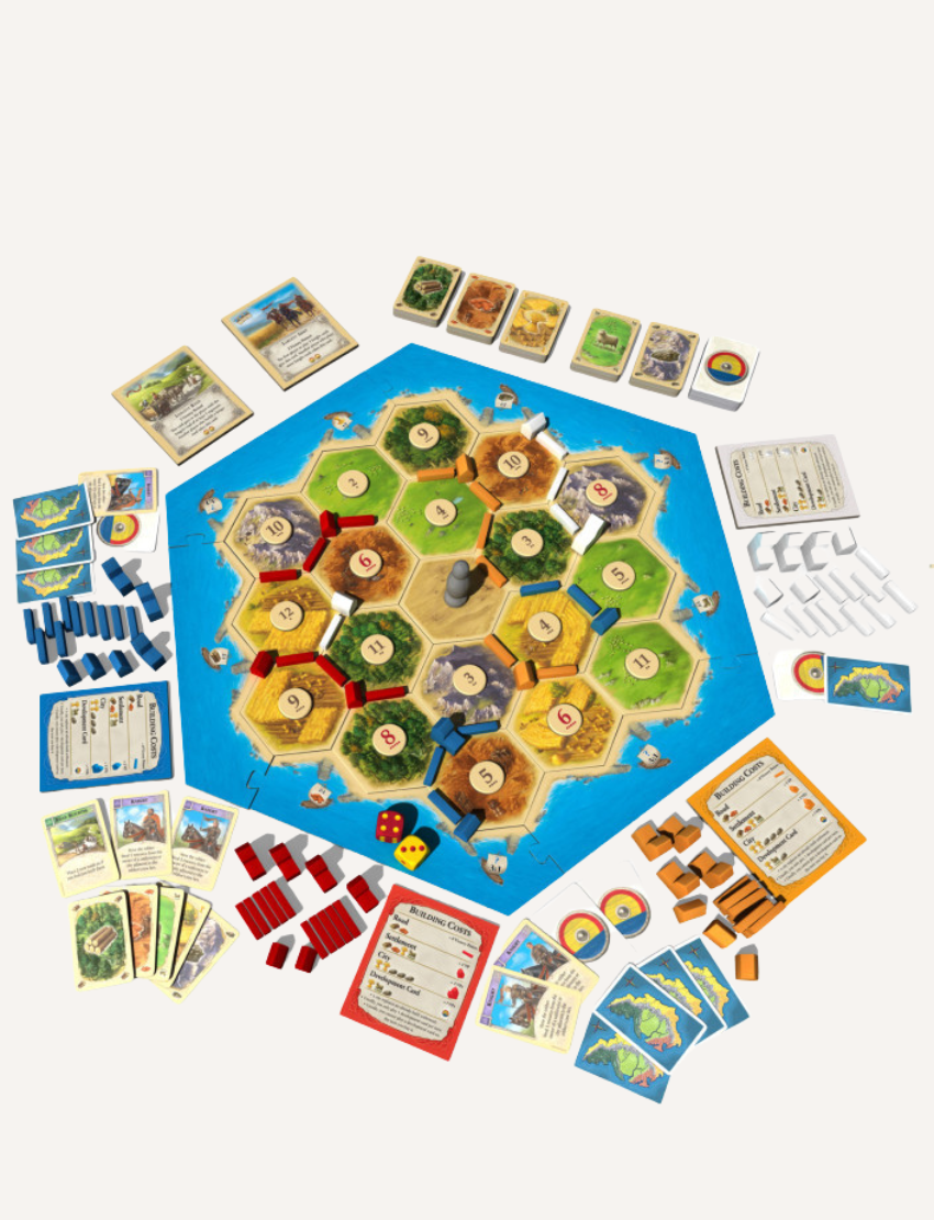 A game setup of Catan Trade Build Settle by VR Distribution includes hexagonal tiles that represent different resources, various cards, dice, small wooden pieces, and player mats arranged for gameplay.