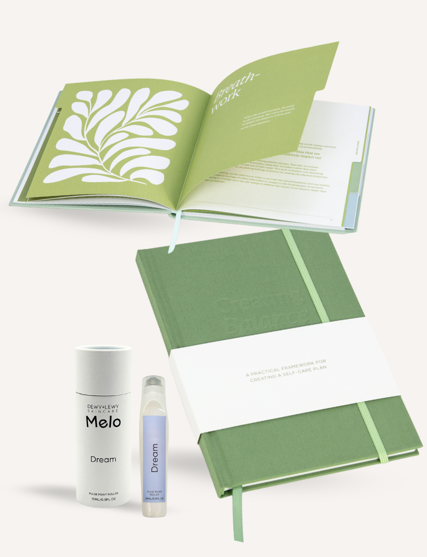 Creating Balance self-care plan journal, Melo Dream roller, and Breathwork open book.
