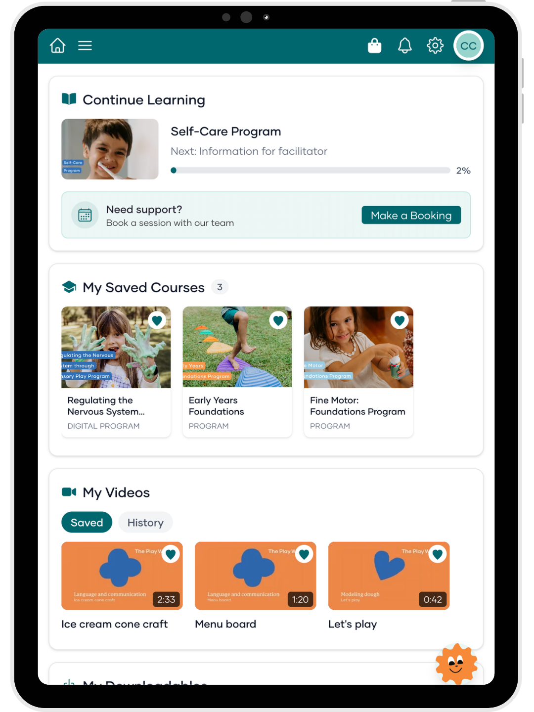 Educational app interface on a tablet screen with various courses and videos displayed.