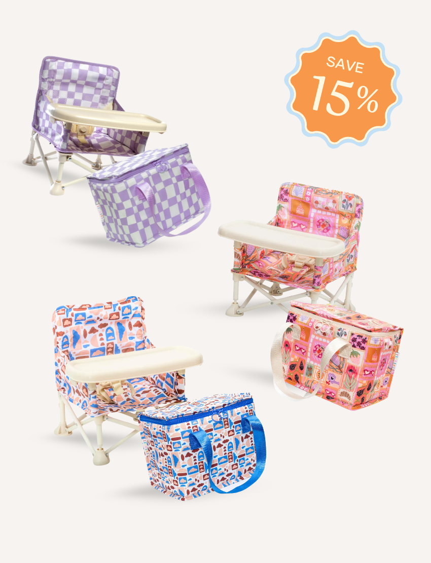 The IZIMINI Chair and Lunch Bag Bundle features three baby chairs with trays in colorful patterns—purple checkered, pink-themed, and blue-themed—ideal for ages 6 months to 3 years. A "Save 15%" badge is in the top right corner.