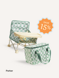 The IZIMINI Chair and Lunch Bag Bundle features three baby chairs with trays in colorful patterns—purple checkered, pink-themed, and blue-themed—ideal for ages 6 months to 3 years. A 