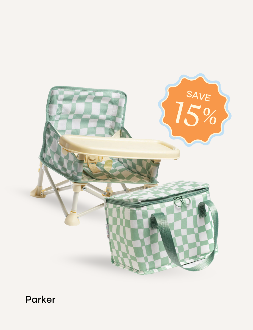 The IZIMINI Chair and Lunch Bag Bundle features three baby chairs with trays in colorful patterns—purple checkered, pink-themed, and blue-themed—ideal for ages 6 months to 3 years. A "Save 15%" badge is in the top right corner.