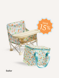 The IZIMINI Chair and Lunch Bag Bundle features three baby chairs with trays in colorful patterns—purple checkered, pink-themed, and blue-themed—ideal for ages 6 months to 3 years. A 