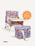 The IZIMINI Chair and Lunch Bag Bundle features three baby chairs with trays in colorful patterns—purple checkered, pink-themed, and blue-themed—ideal for ages 6 months to 3 years. A 