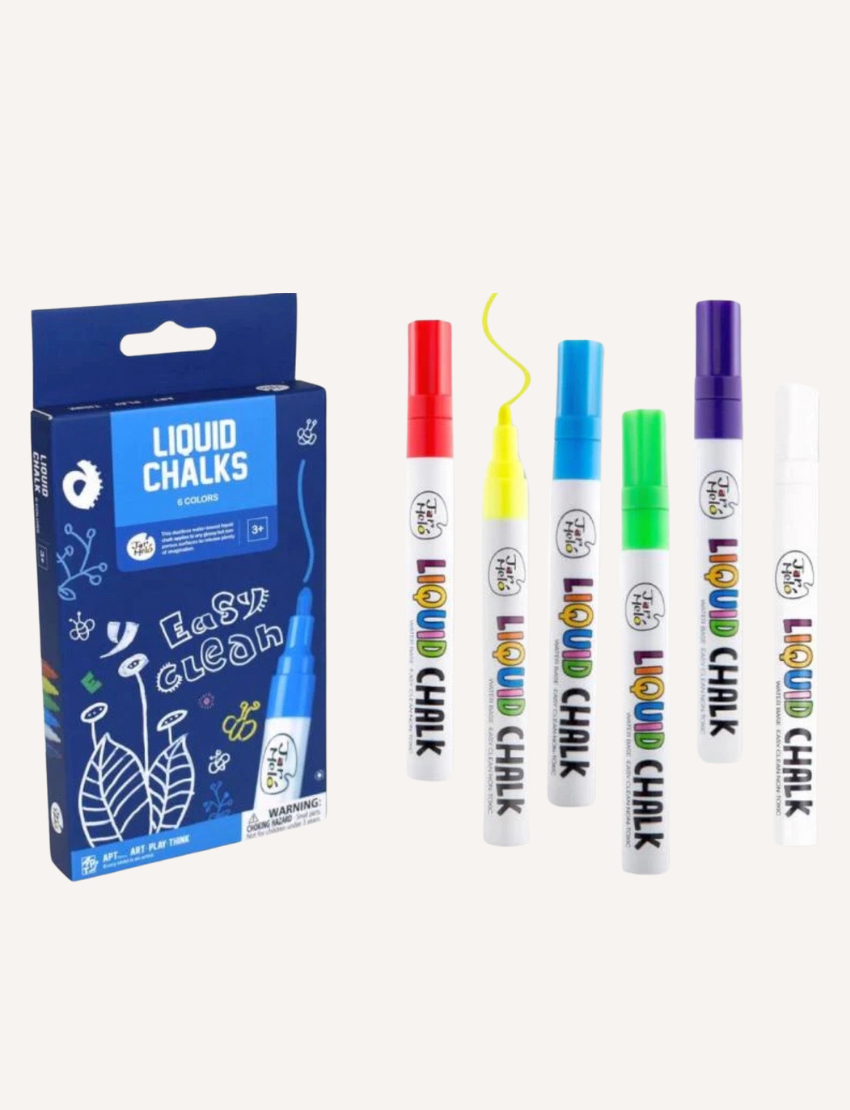 A box of liquid chalk markers from Jar Melo, labeled "Liquid Chalk Markers," comes in blue packaging adorned with playful illustrations of leaves and doodles. It promises "Easy Clean" functionality and is designed for children aged 3 and up. A warning label is also present on the bottom right corner.