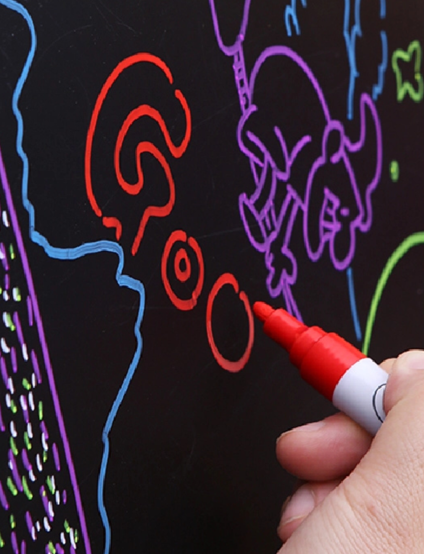 A box of liquid chalk markers from Jar Melo, labeled "Liquid Chalk Markers," comes in blue packaging adorned with playful illustrations of leaves and doodles. It promises "Easy Clean" functionality and is designed for children aged 3 and up. A warning label is also present on the bottom right corner.