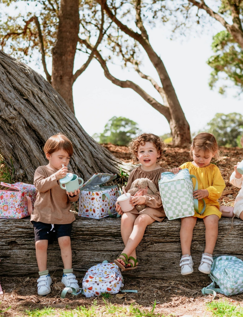 The IZIMINI Lunch Bag is a rectangular, eco-friendly option with yellow and white vertical stripes. This BPA-free design includes a top zipper and white handles for easy carrying.