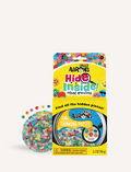 The image displays the packaging for Crazy Aarons Mixed Emotions Hide Inside Putty. It features a tin of putty, a checklist of hidden objects, and various play suggestions on the back. The packaging is vibrant with yellow and blue accents.