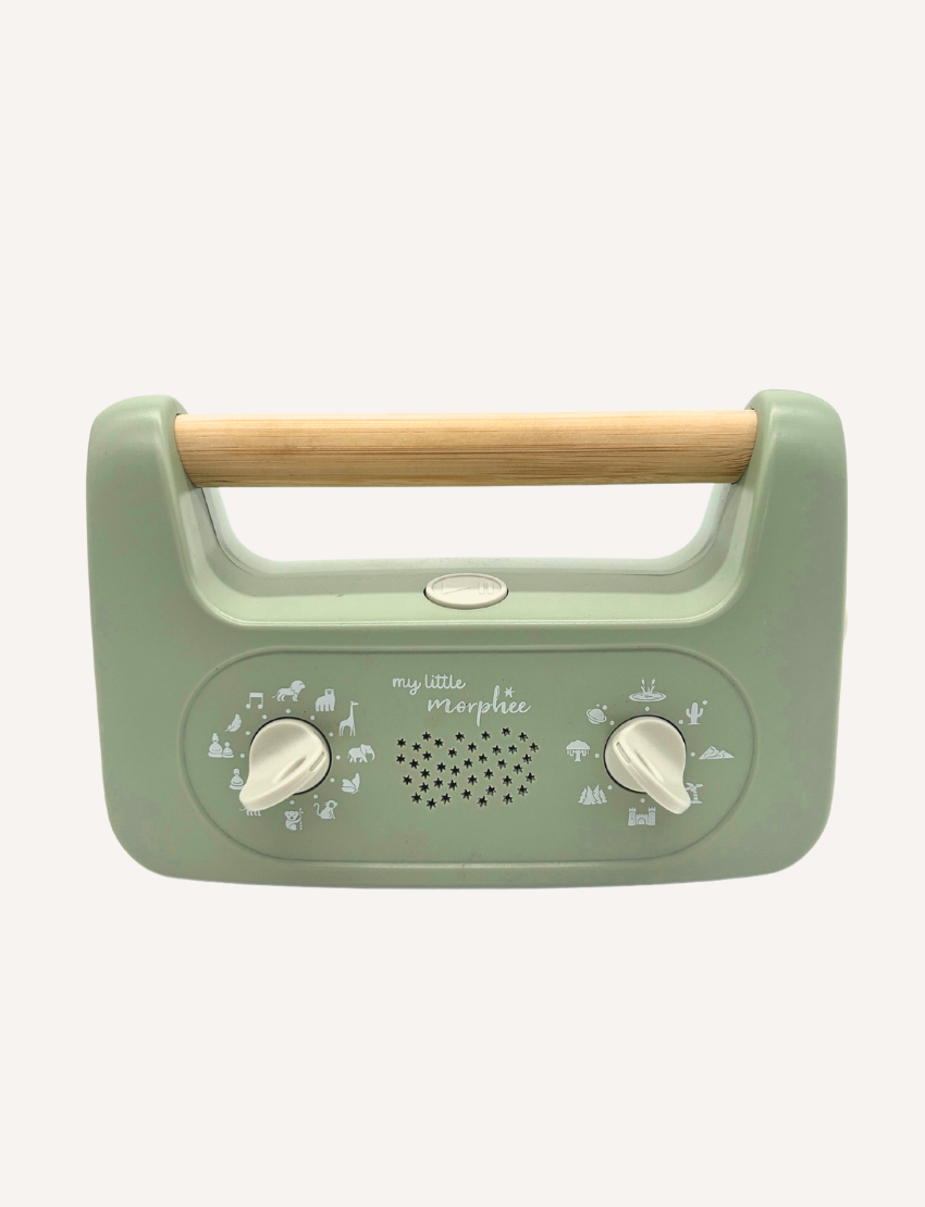 Sage green 'My Little Morphee' sleep aid device with a wooden handle, front view.