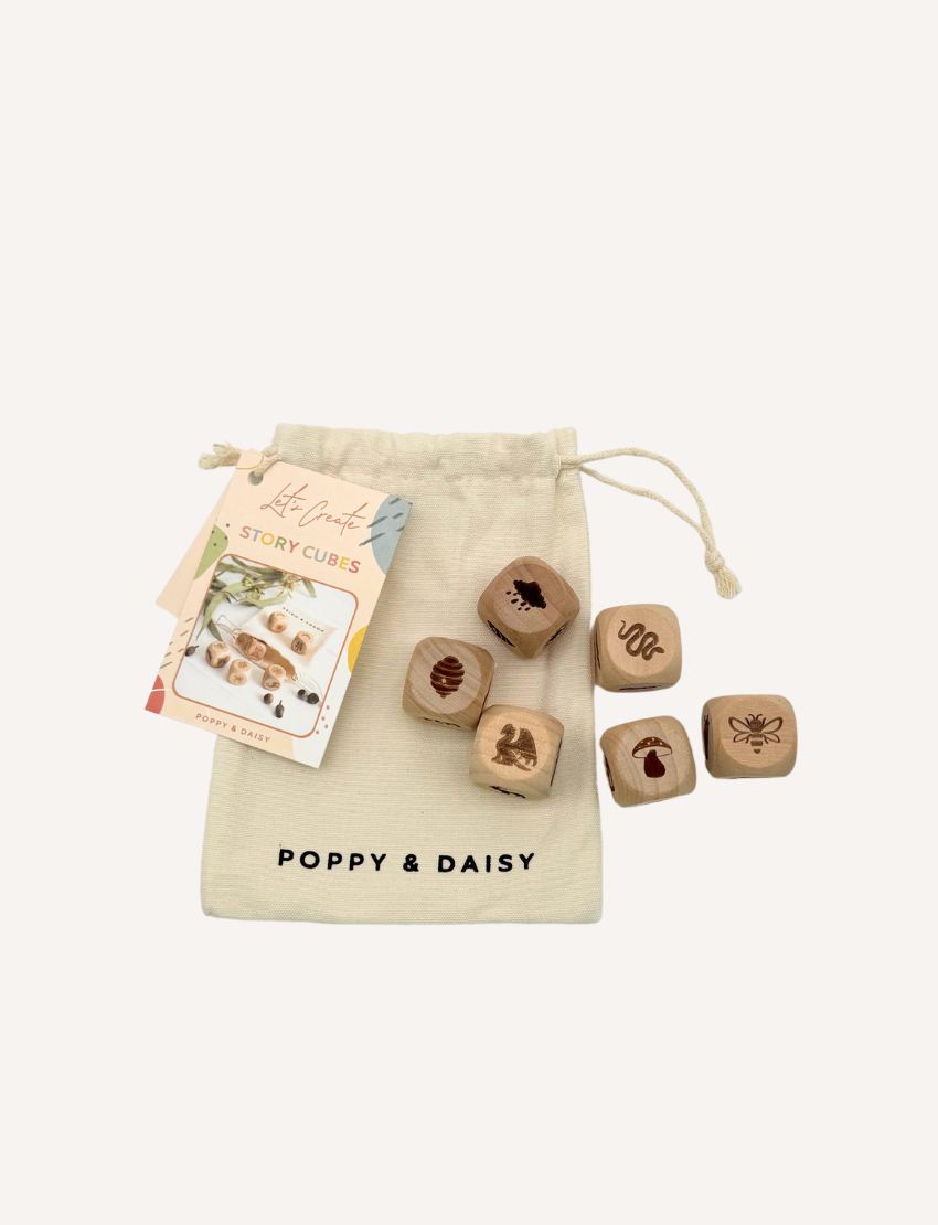Poppy & Daisy nature story cubes with nature illustrations, along with a drawstring bag.