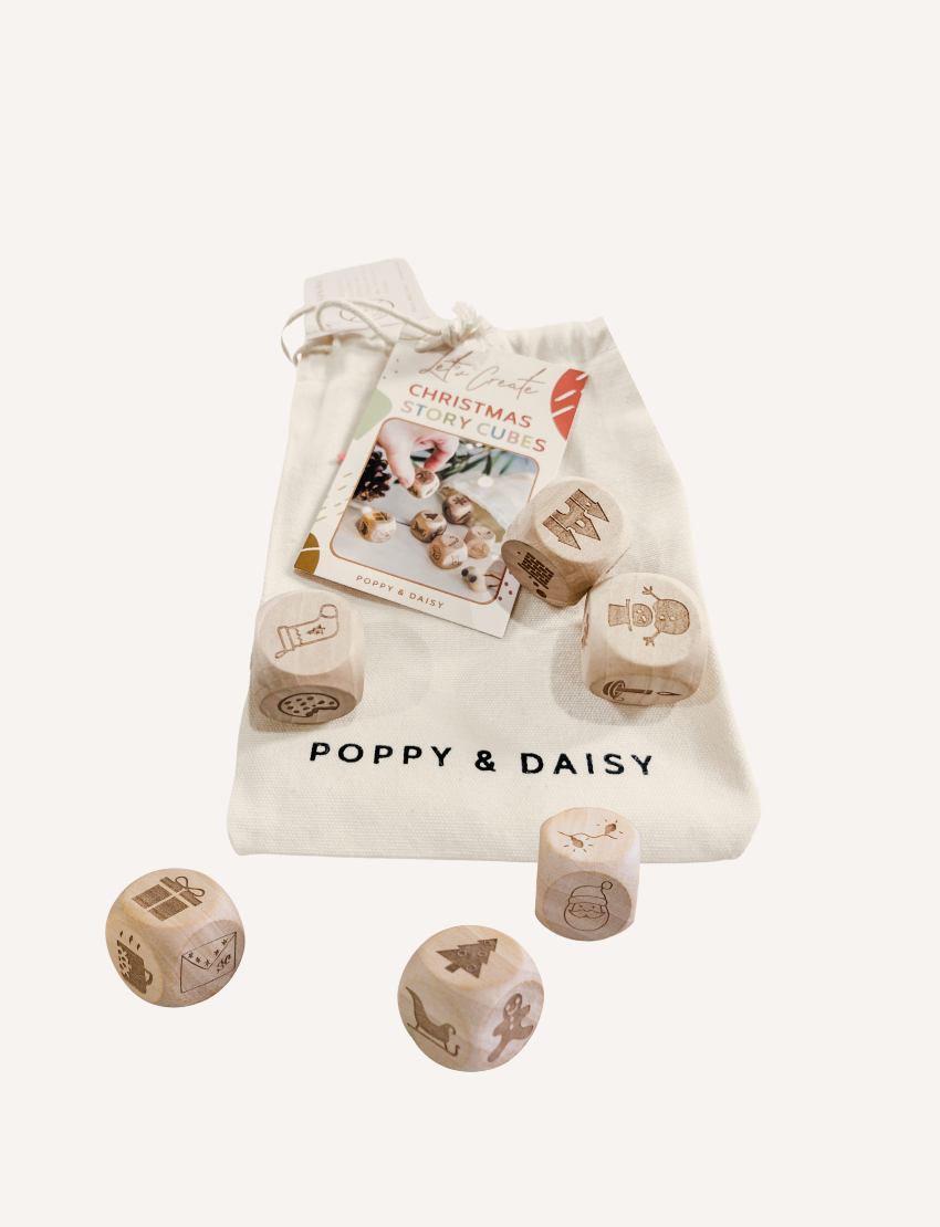 Poppy & Daisy 'Let's Create Christmas Story Cubes' DIY kit with canvas bag and wooden cubes.